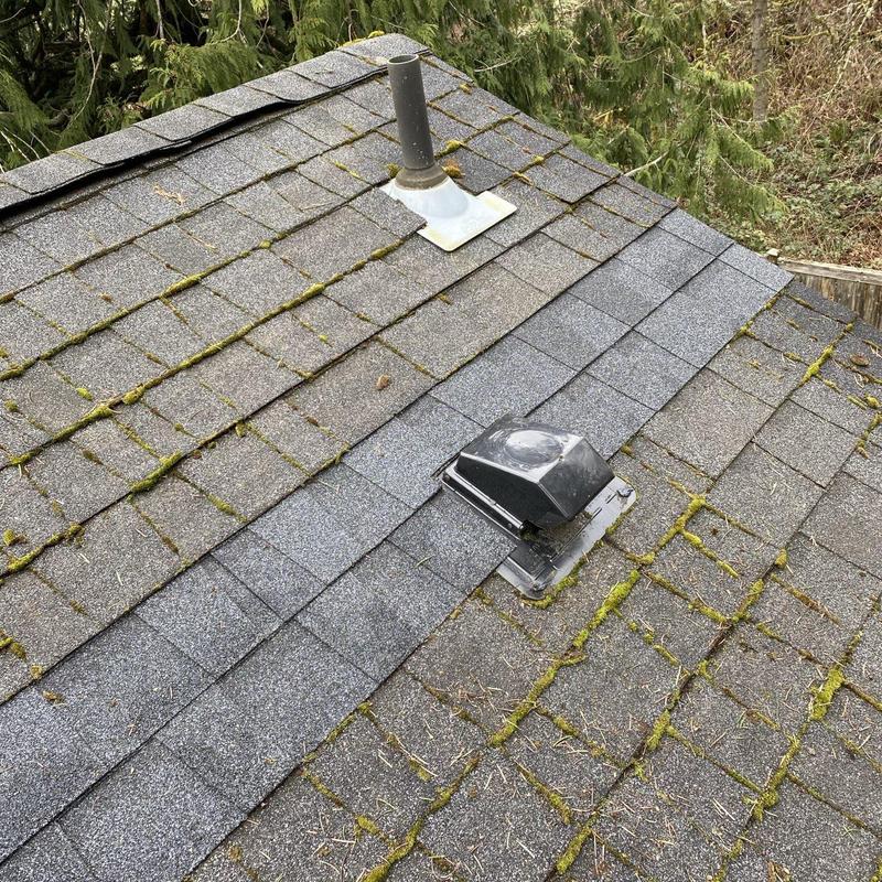 Asphalt shingle roof with vent pipe and new shingles