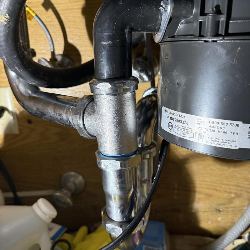 Garbage disposal with new P-trap and waste kit installation