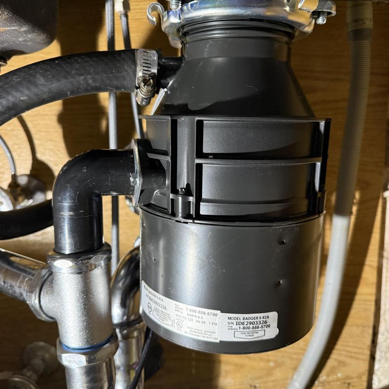 Garbage disposal with new P-trap and waste kit installation
