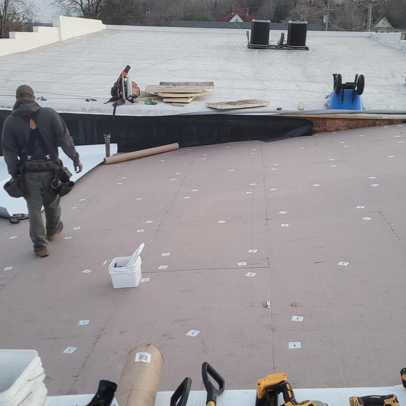 TPO roofing installation over ISO board insulation
