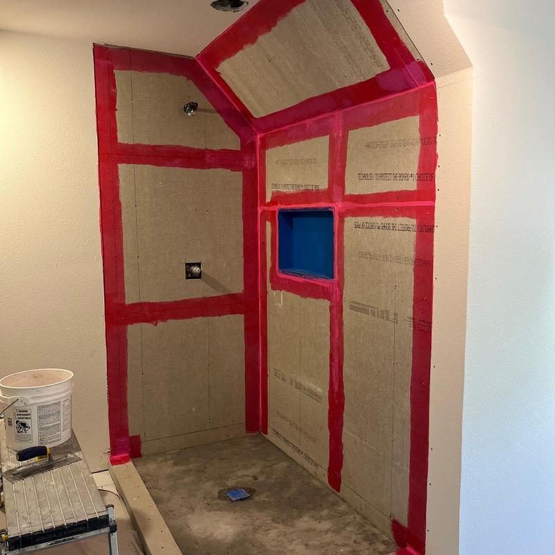 Shower waterproofing installation in corner bathroom alcove Shower waterproofing installation in corner bathroom alcove