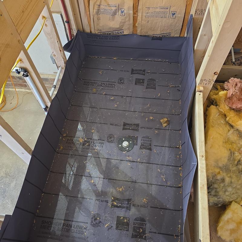 Waterproof shower pan liner installation in framing