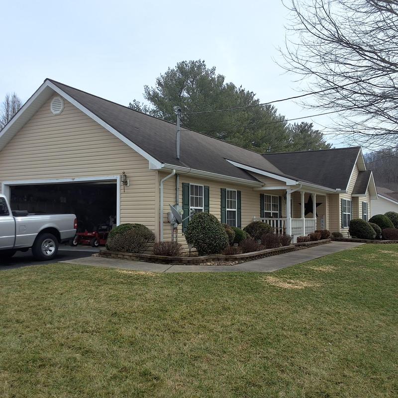 Asphalt shingle roof with wind and hail damage inspection
