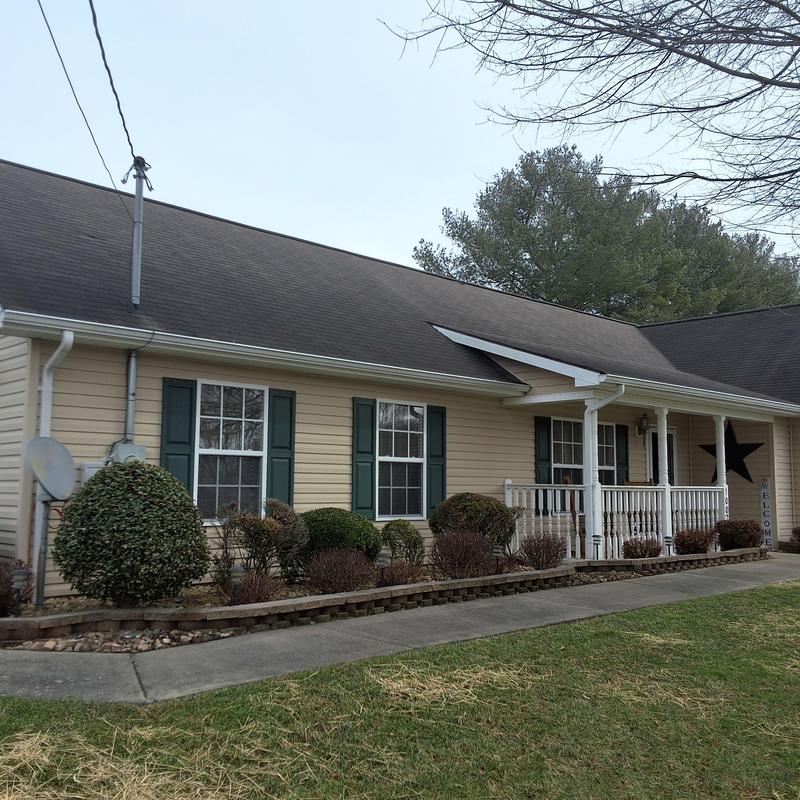 Asphalt shingle roof with hail and wind damage inspection
