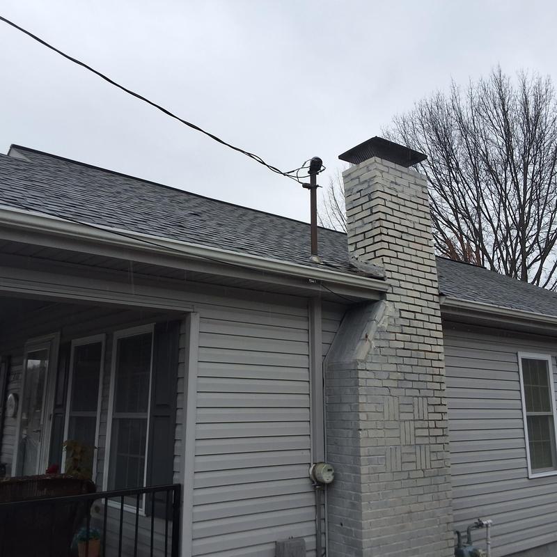 Chimney and roof shingles with leak inspection