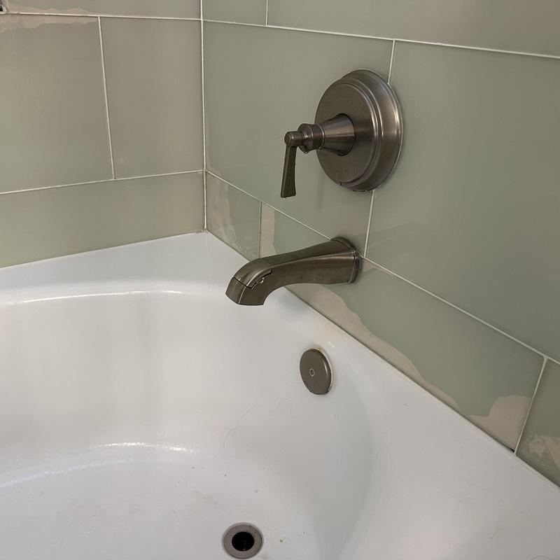 Tub spout with diverter replacement in bathroom bathtub