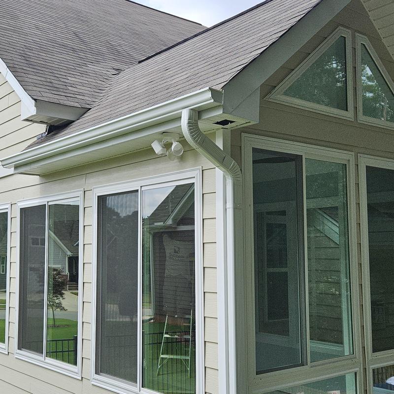 4-season sunroom with large windows and gutters 4-season sunroom with large windows and gutters