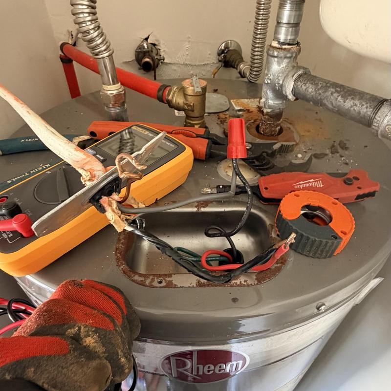 Electric water heater wiring with testing tools