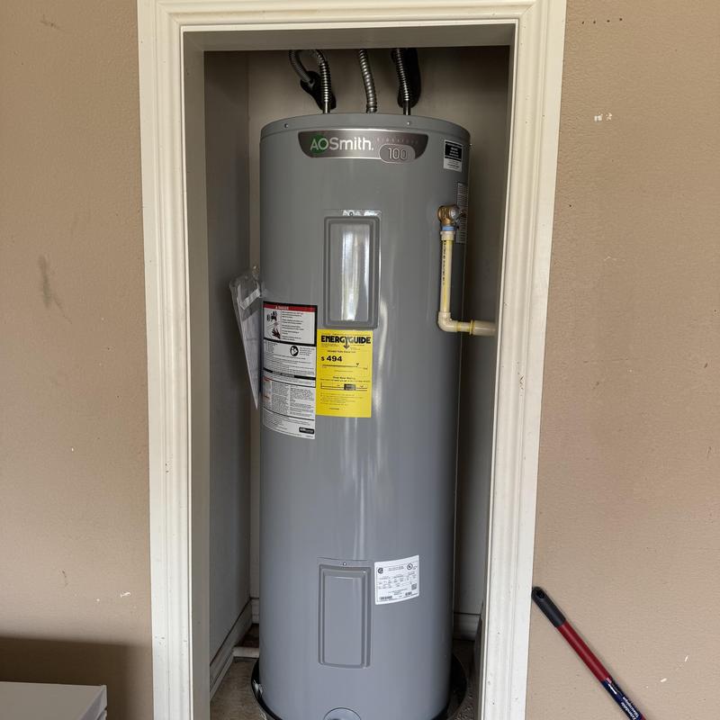Electric water heater with new ball valve and drain pan