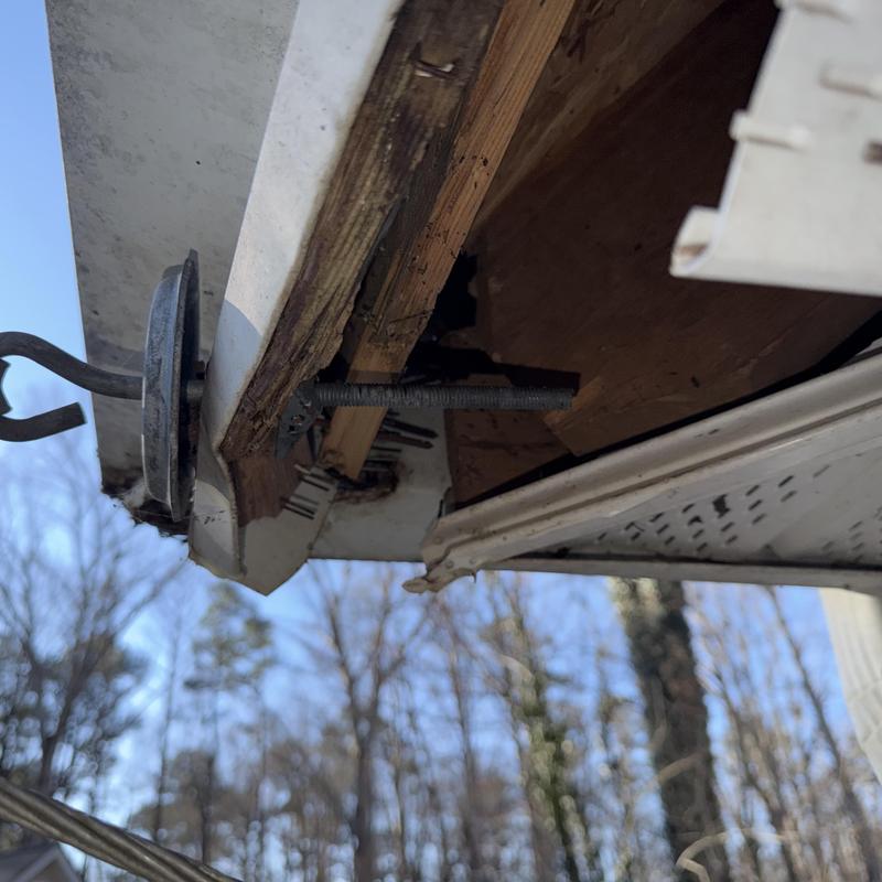 Damaged wood fascia with gutter and soffit detail