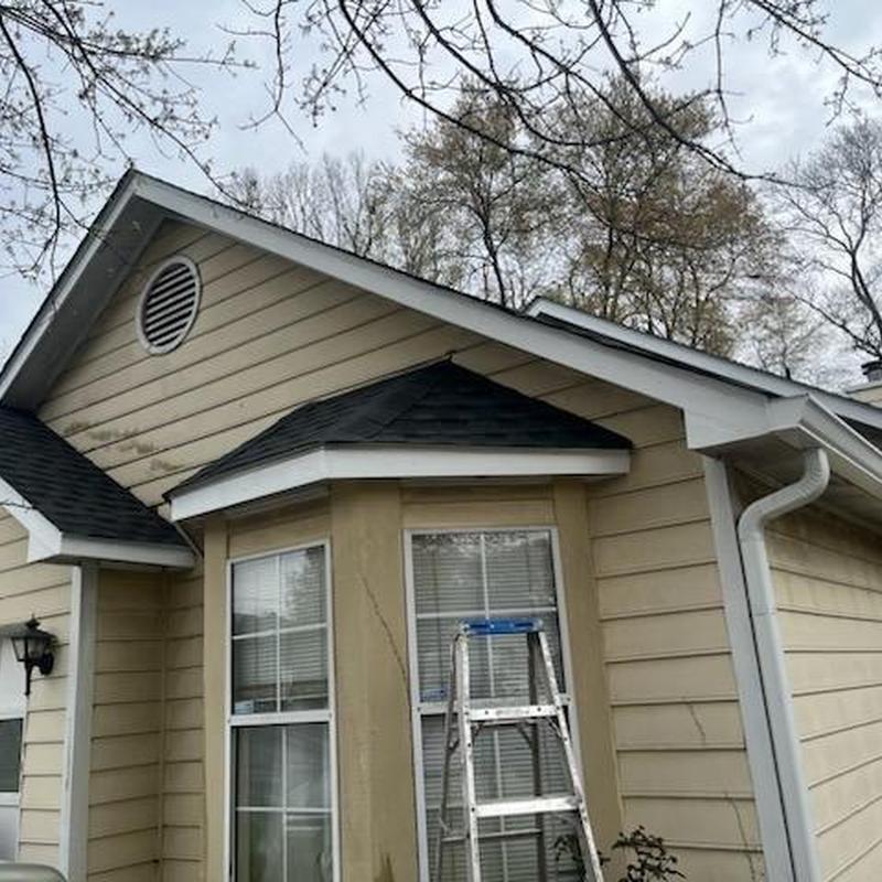 Roof shingles replacement on residential home exterior Roof shingles replacement on residential home exterior