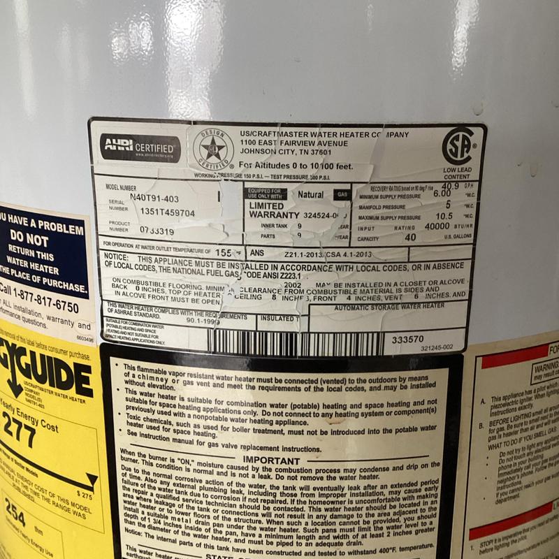 Natural gas water heater label with installation details Natural gas water heater label with installation details