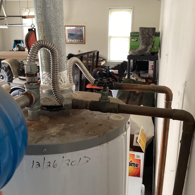 Natural gas tanked water heater with valve and piping Natural gas tanked water heater with valve and piping