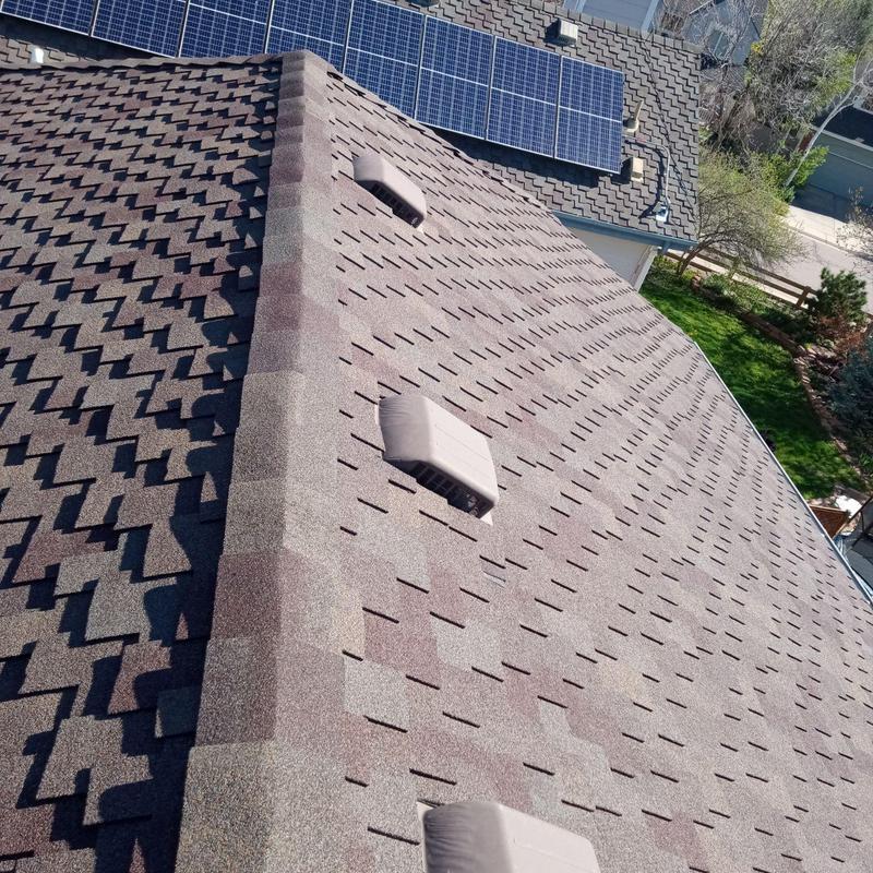 Shingle roof with vents and solar panels in Superior CO Shingle roof with vents and solar panels in Superior CO