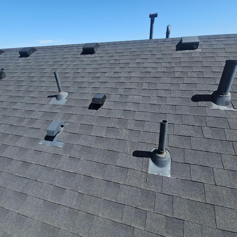 Shingle roof with pipe jacks and vents in good condition Shingle roof with pipe jacks and vents in good condition