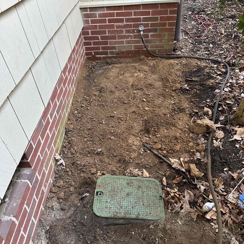 Water meter valve box uncovered in residential yard Water meter valve box uncovered in residential yard