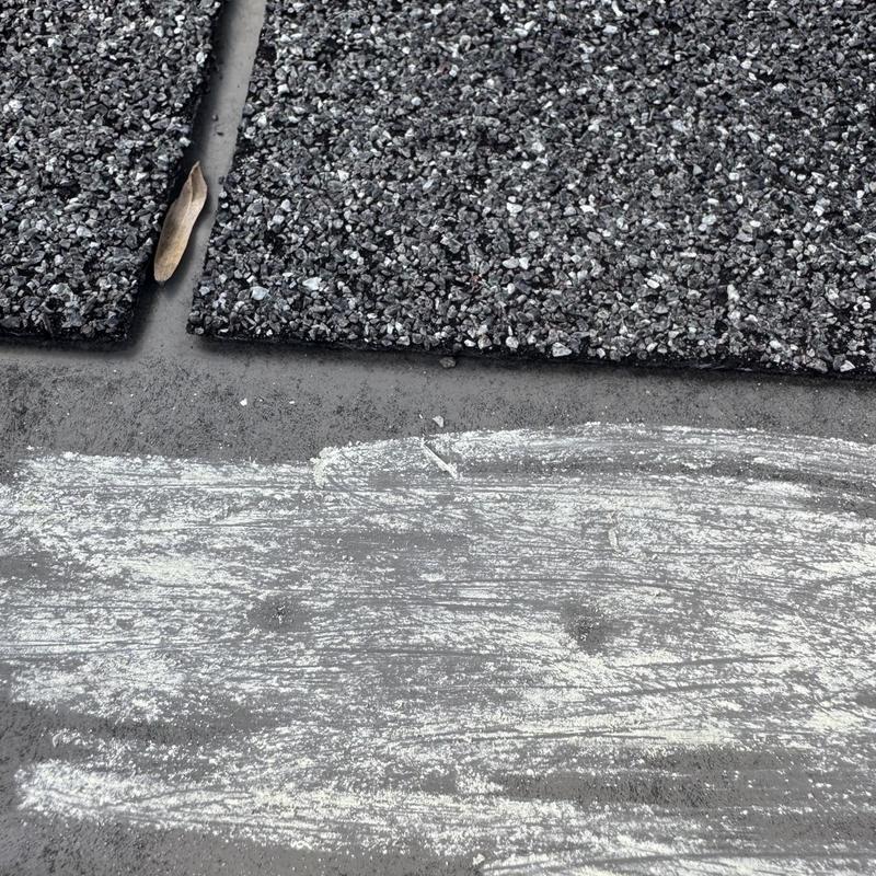 Roof shingles with hail damage and chalk marking Roof shingles with hail damage and chalk marking