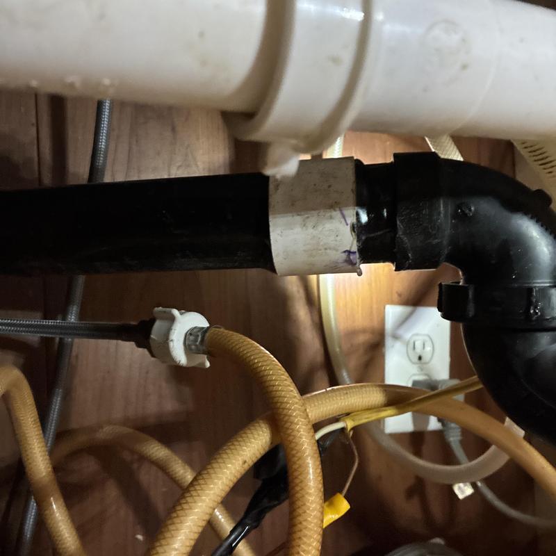 Washer box drain pipe with new sweep fitting under sink