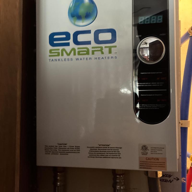 Tankless water heater control panel close-up