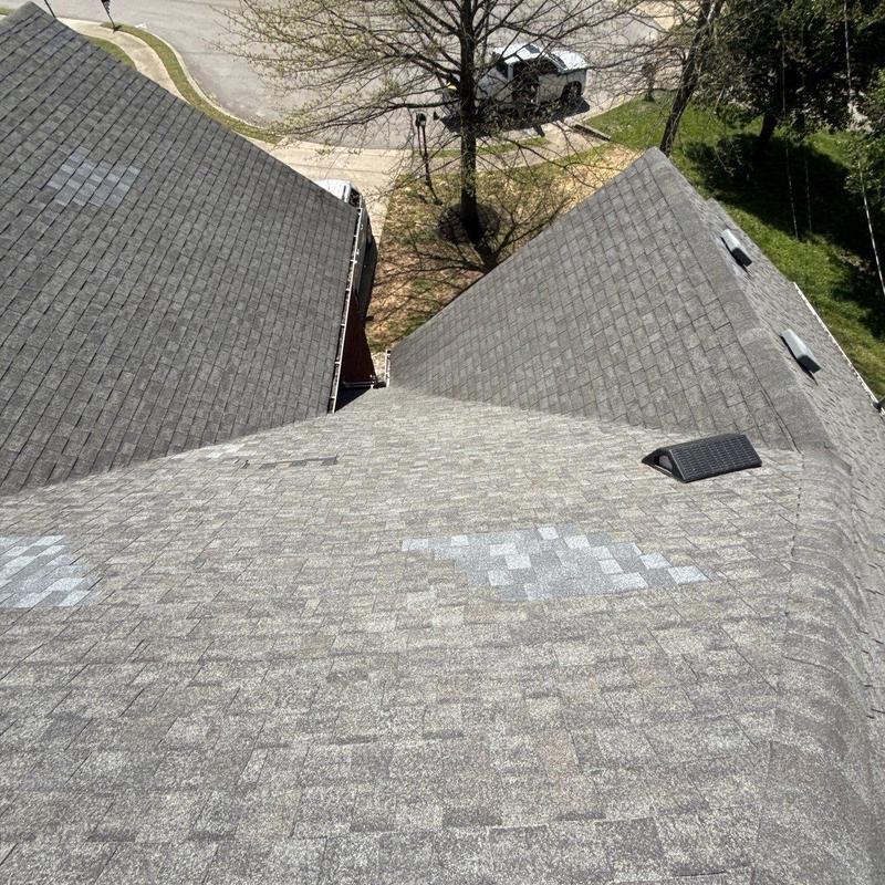 Asphalt shingles with hail damage on residential roof