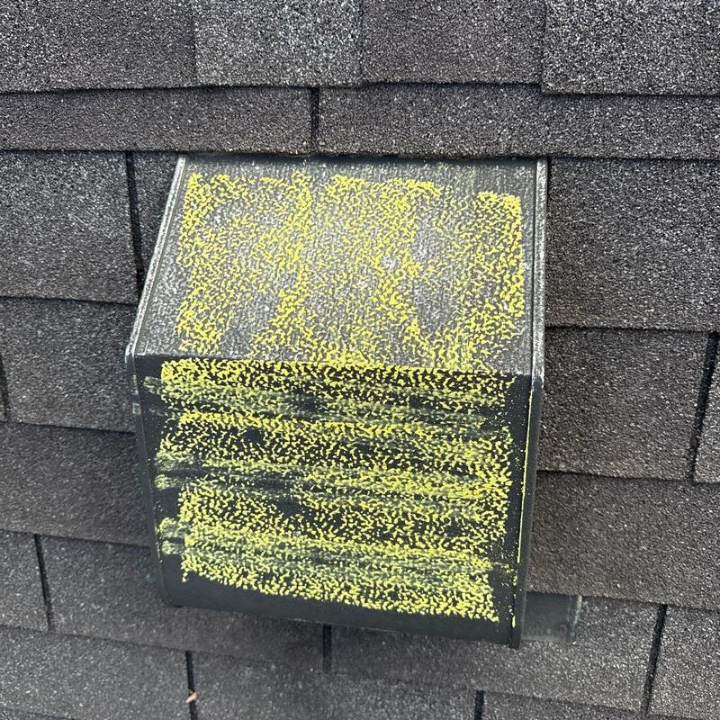 Roof vent with yellow hail damage markings