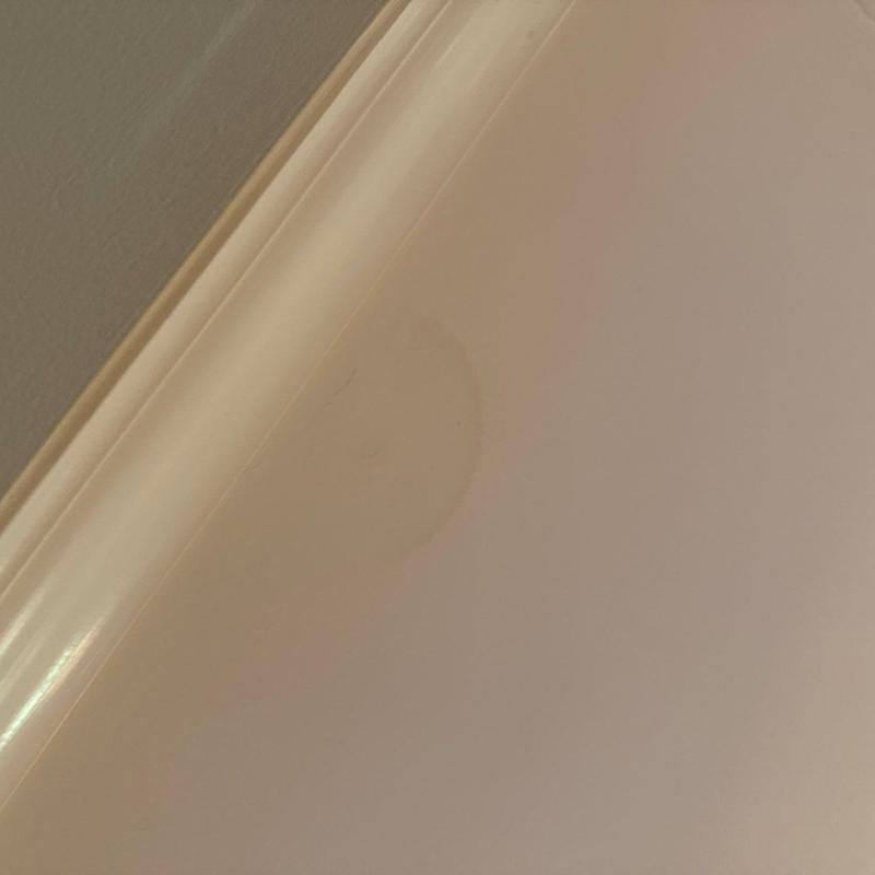 Ceiling water stain near crown molding trim