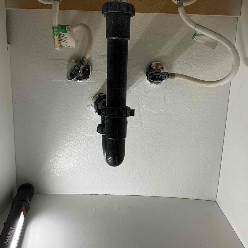 Hot and cold angle stop valves under vanity plumbing