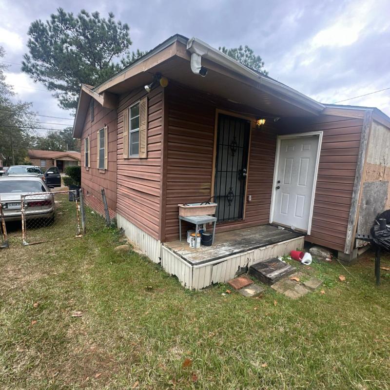 Wooden porch and exterior siding inspection in Florence, MS