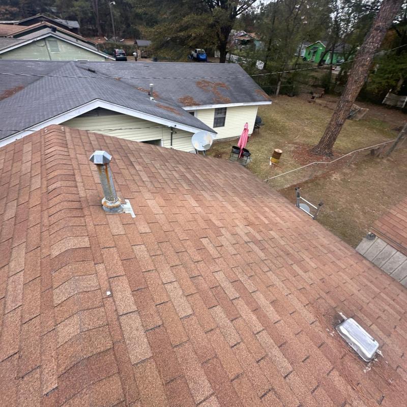 Asphalt shingle roof with vent pipe inspection