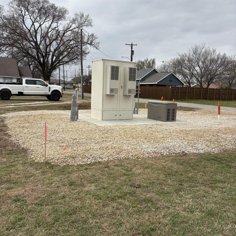 Standby generator gas line installation site with equipment