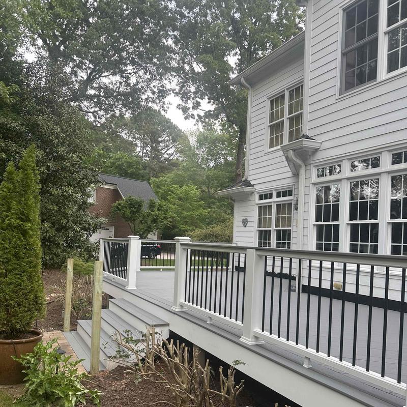 Trex decking system with black metal railing Trex decking system with black metal railing