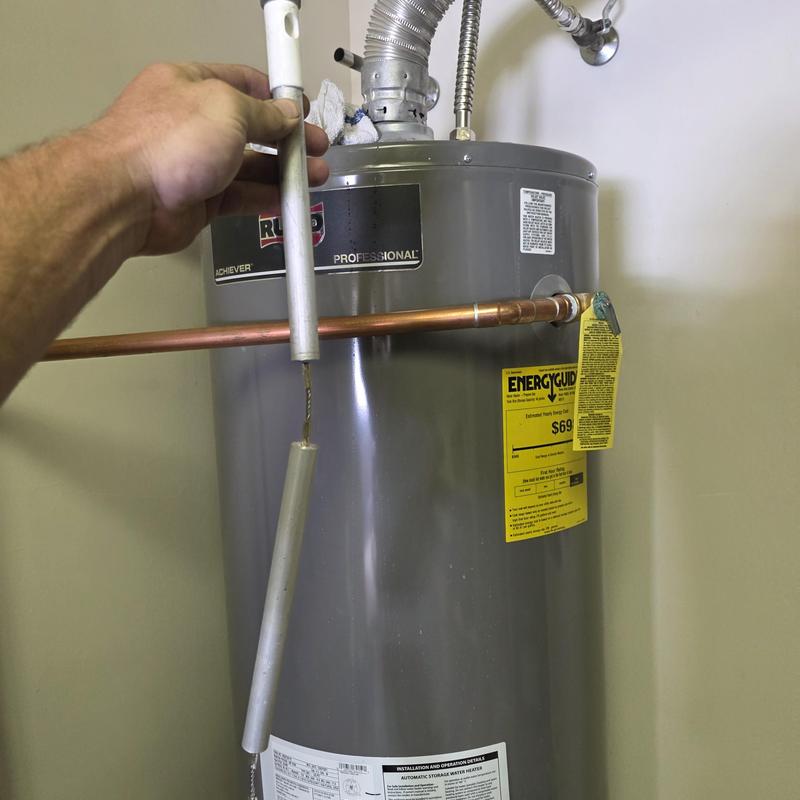 Water heater anode rod replacement and flushing service