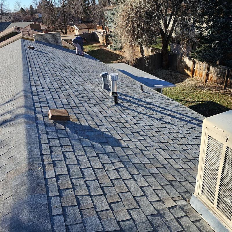 Asphalt shingle roof with sealed pipe jacks and vents Asphalt shingle roof with sealed pipe jacks and vents