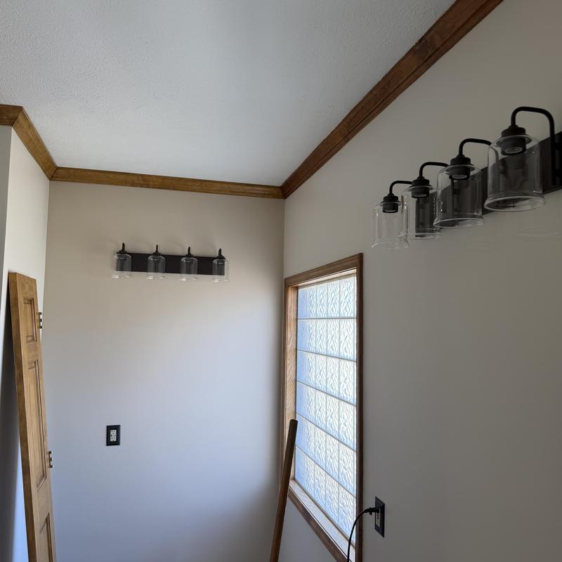 Light fixtures with glass shades installation in room