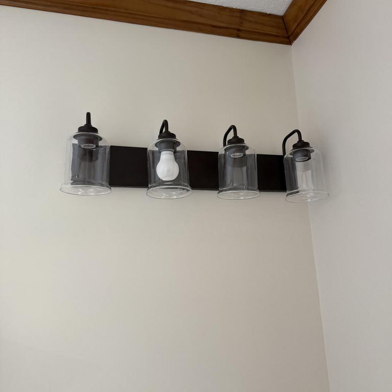Bathroom vanity light fixture with clear glass shades