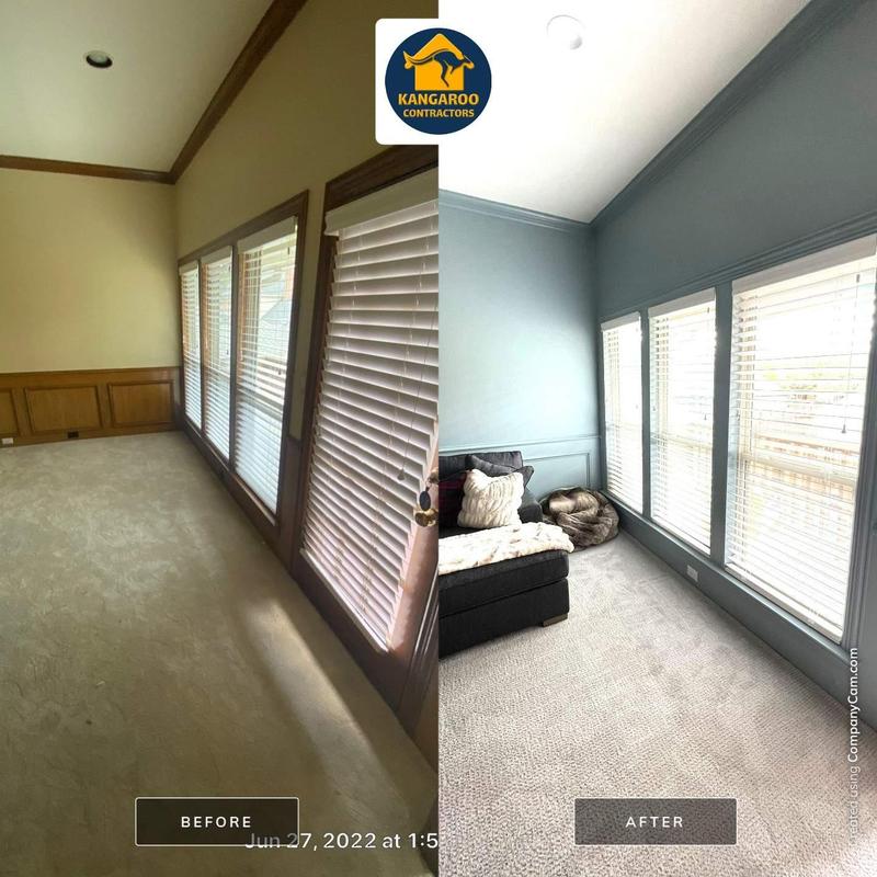 Wall paneling and trim painted for modern update