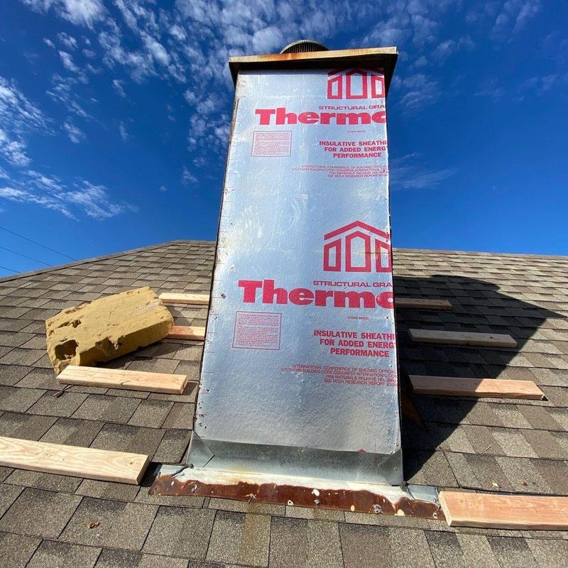 Chimney siding with Thermo insulation sheathing on roof Chimney siding with Thermo insulation sheathing on roof