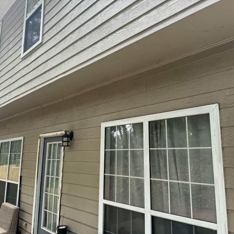 Roof flashing and trim replacement on residential siding