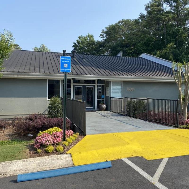 Metal roof on leasing office exterior in Atlanta, GA