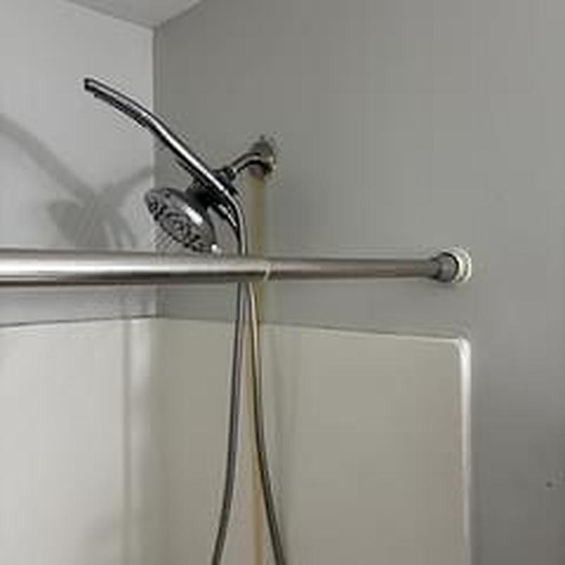 Shower head and wall with new plumbing installation