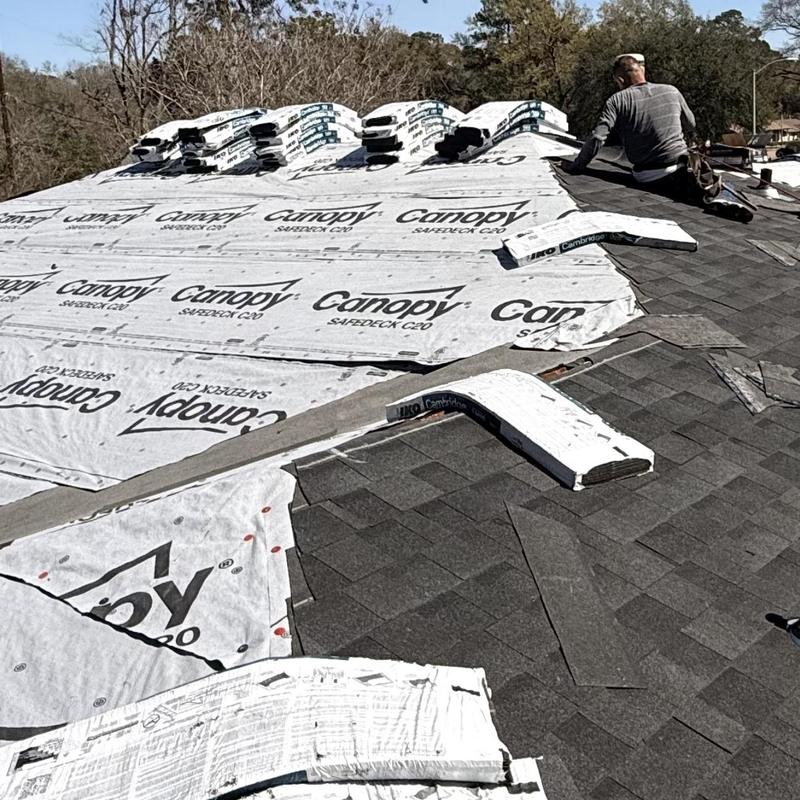 Asphalt shingle roof installation with ridge vents
