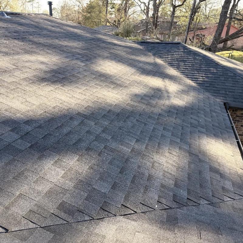 Asphalt shingle roof with ridge vent and drip edge