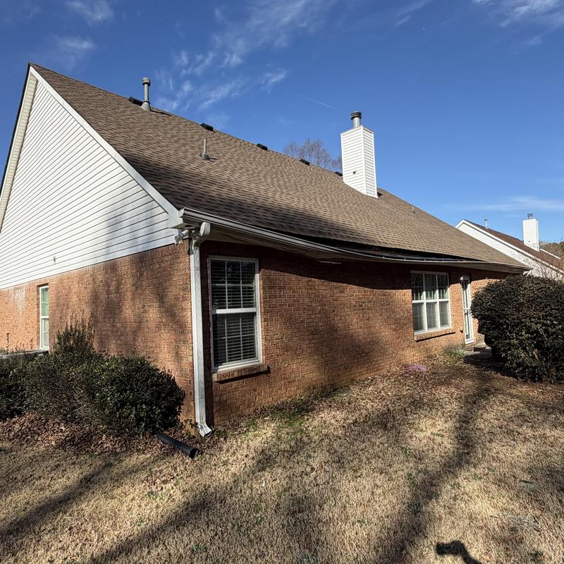 Gutter and fascia damage on brick house exterior