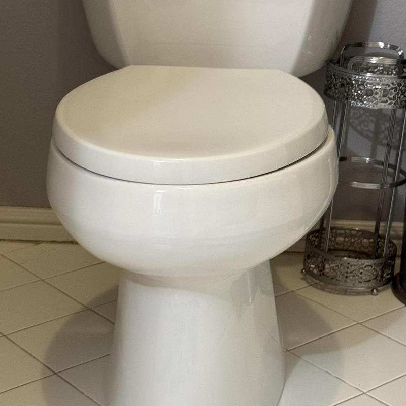 Toilet with replaced wax seal in bathroom