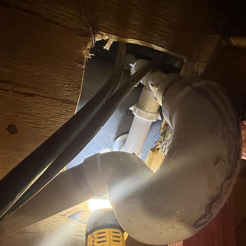 Tub drain pipes with replaced leak repair and fittings