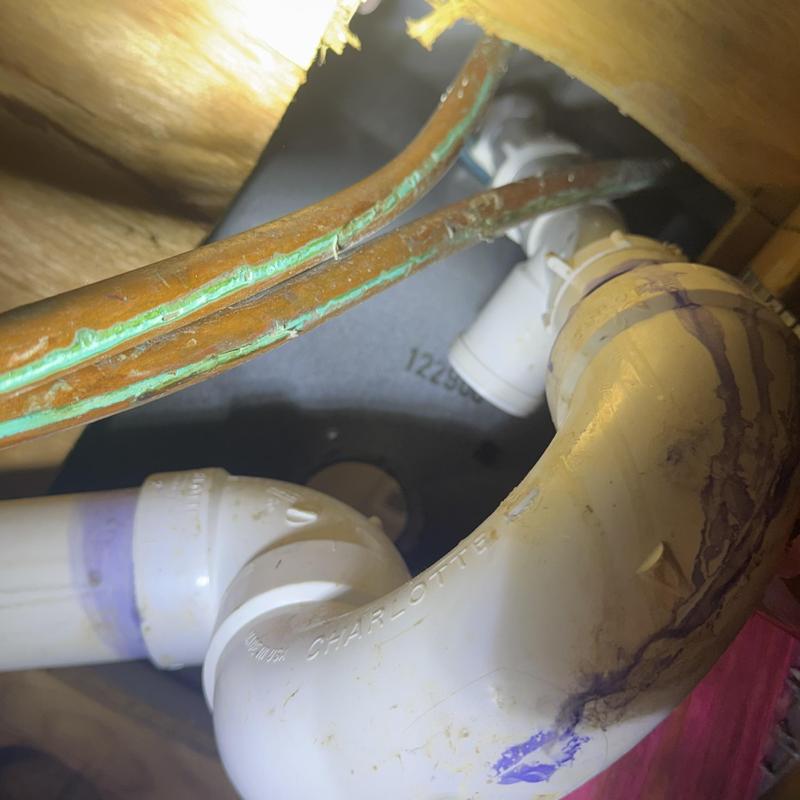 Tub drain PVC piping with copper water lines and fittings