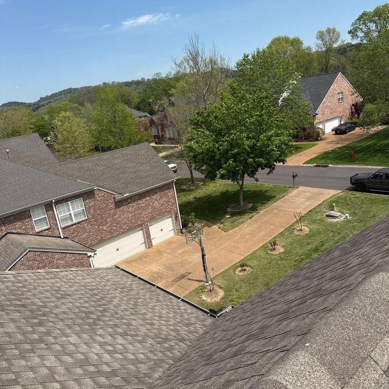 Asphalt shingle roof inspection showing hail damage