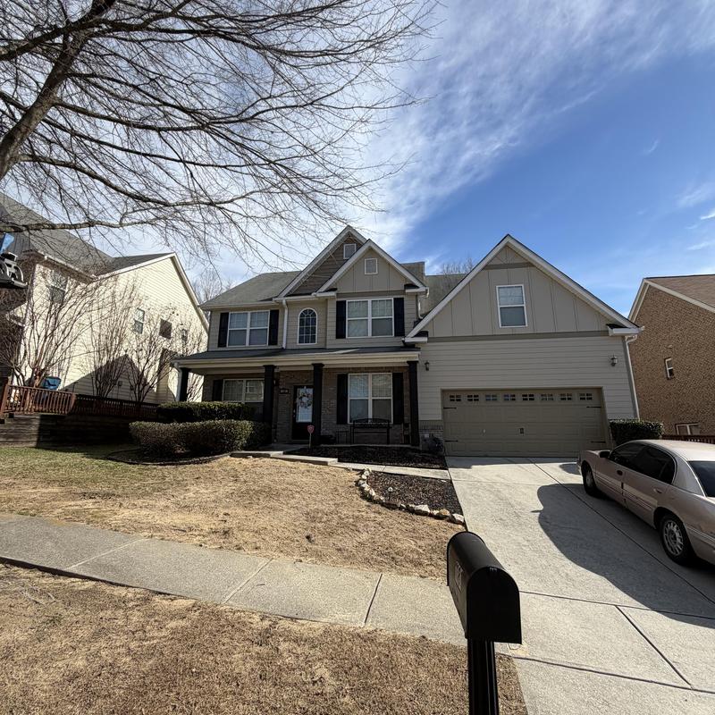 3-tab asphalt roof with 5 missing shingles, replacement recommended