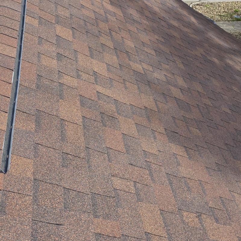 Asphalt shingle roof near metal vent strip in Terrell, TX