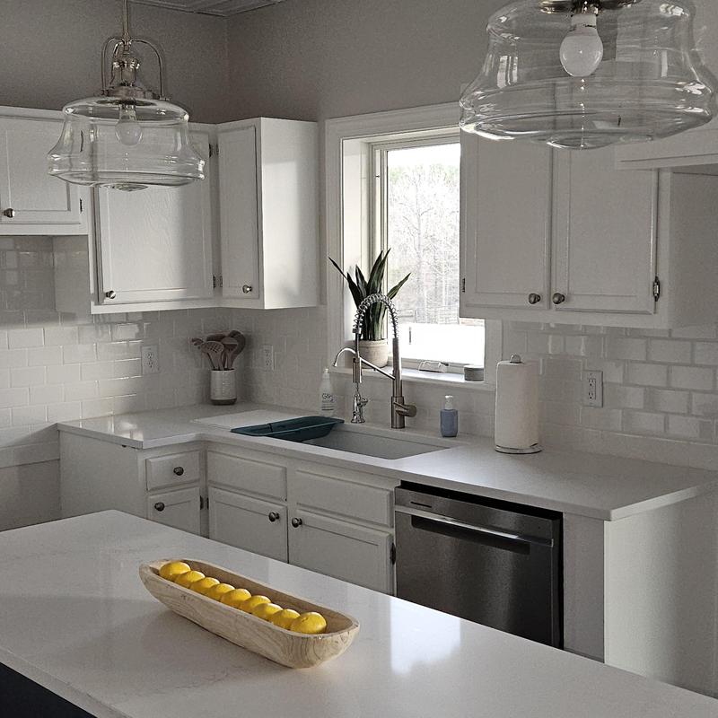 Modern kitchen sink and white cabinetry installation Modern kitchen sink and white cabinetry installation
